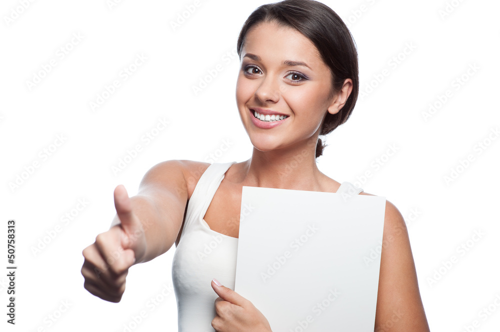 casual young brunette girl holding sign casual young brunette girl holding sign
