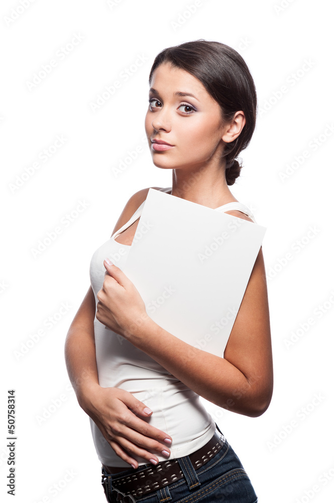 casual young brunette girl holding sign casual young brunette girl holding sign