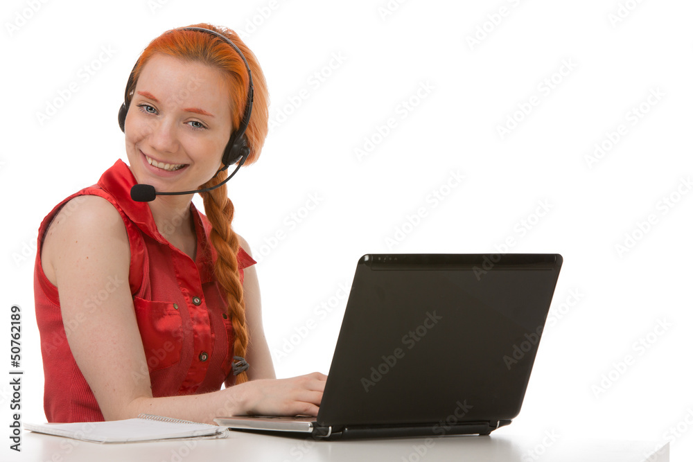 Smiling Business Woman talking on the phone with headset. Smiling Business Woman talking on the phone with headset.