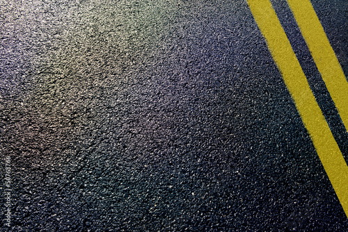 Fényképezés asphalt detail with yellow double line