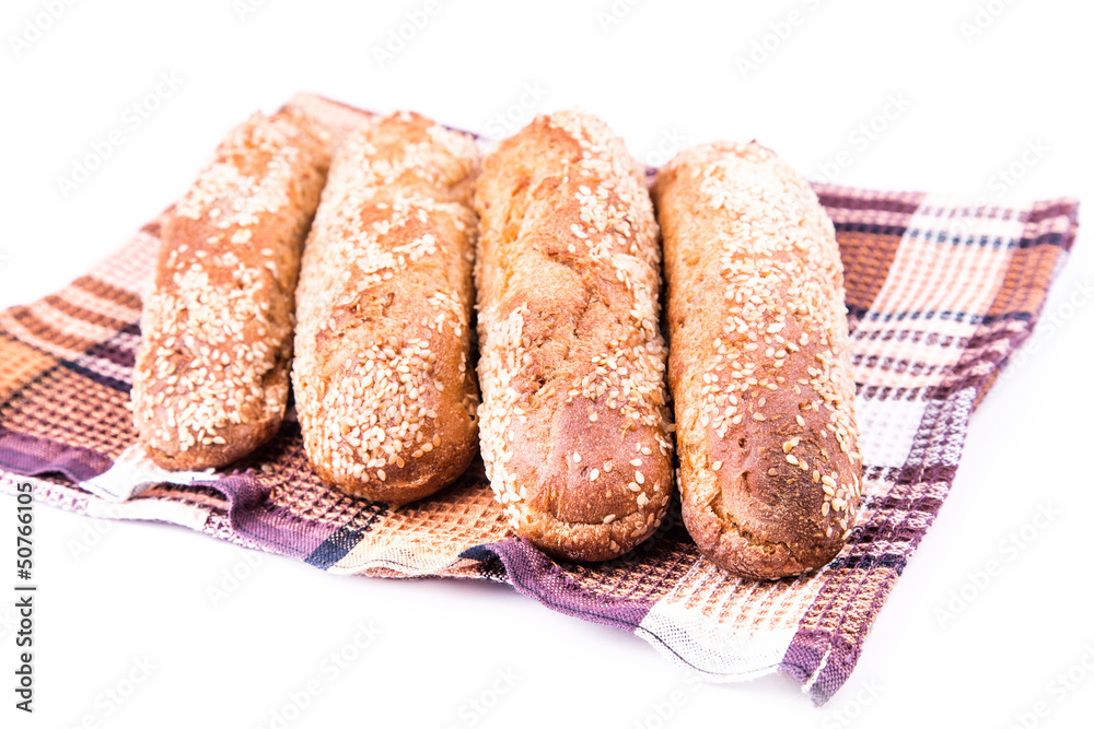 Freshly baked bread rolls with sesame Freshly baked bread rolls with sesame