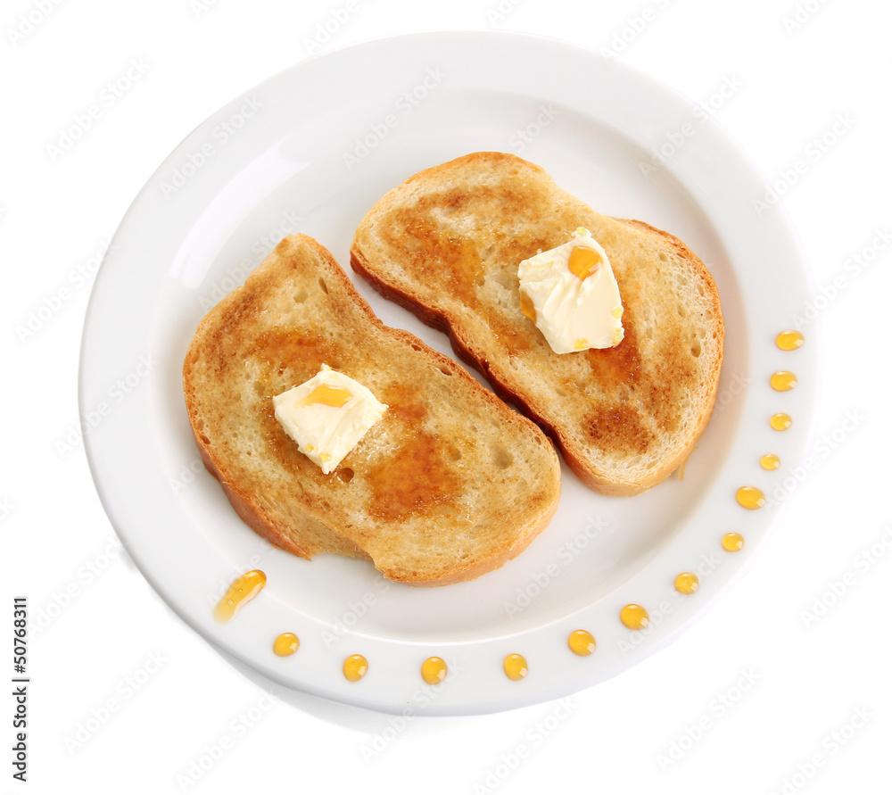 White bread toastwith honey on plate, isolated on white White bread toastwith honey on plate, isolated on white