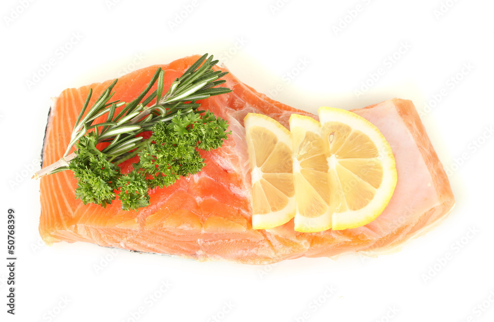 Fresh salmon fillet with herbals and lemon slices, isolated