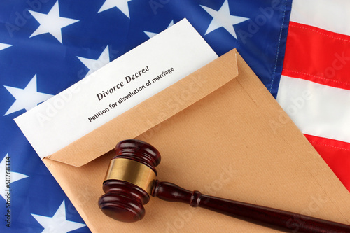 Divorce decree and envelope on american flag background