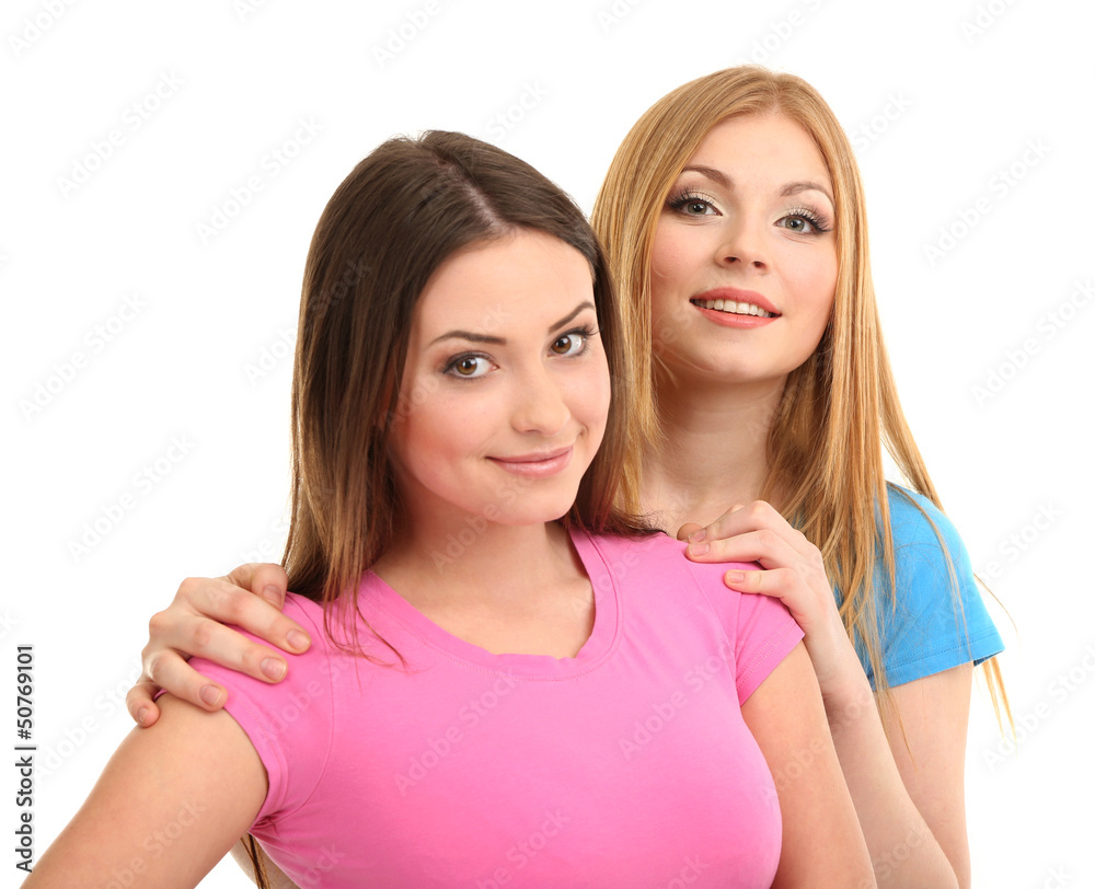 Two girl friends smiling isolated on white Two girl friends smiling isolated on white