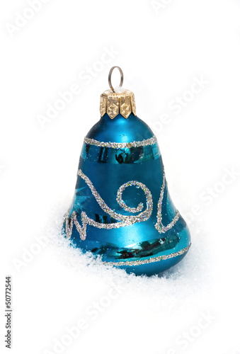 blue christmas hand bell with snow isolated on white