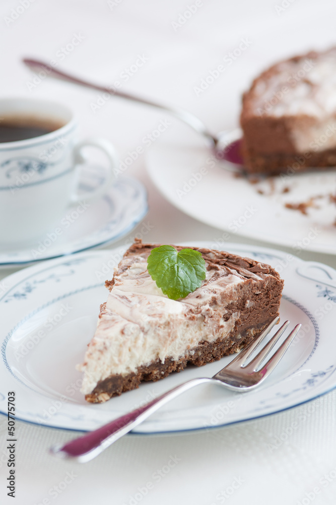 Beautiful chocolate-raw cheese cake ready to eat Beautiful chocolate-raw cheese cake ready to eat