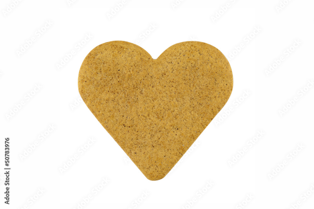 Obraz premium Heart shape gingerbread cookie isolated on white