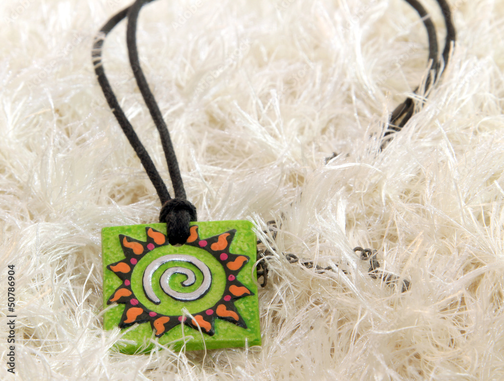 Naklejka premium clay amulet sun