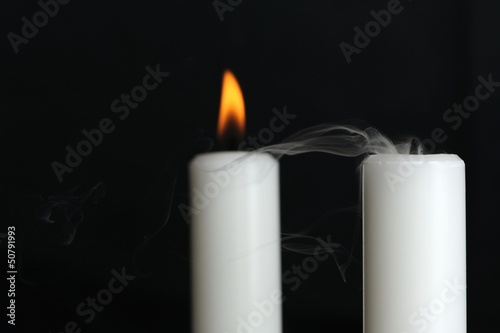 Burning and Blown Out Candle with Smoke