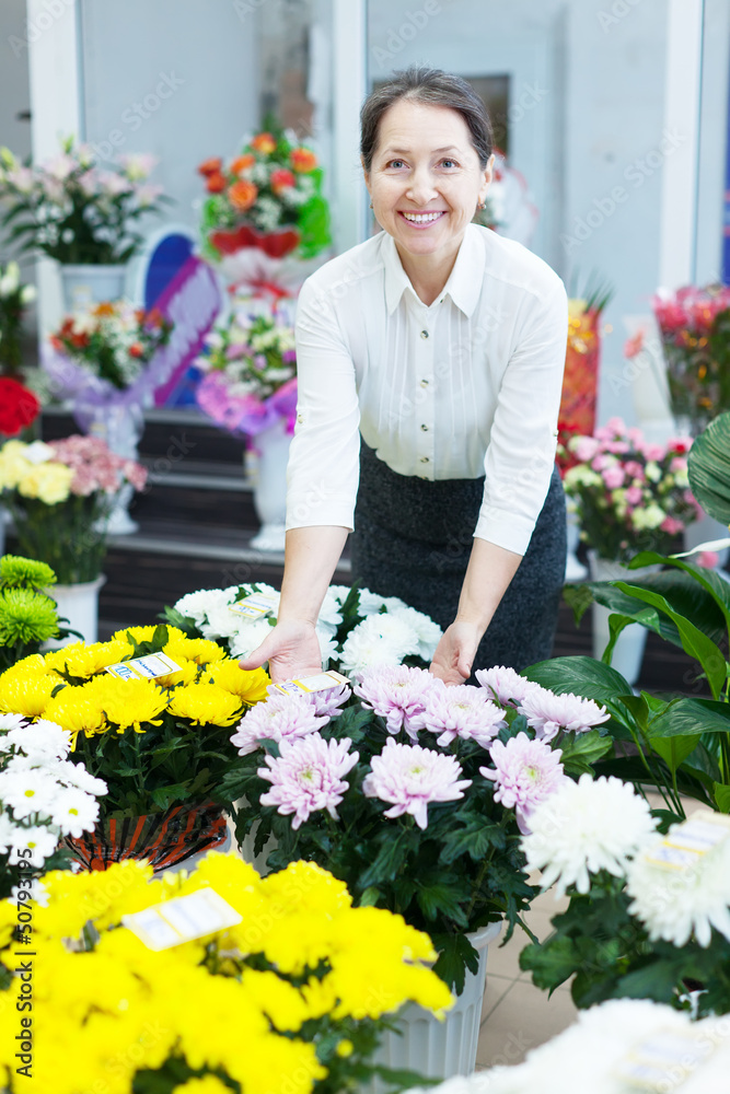 mature woman in flowers shop