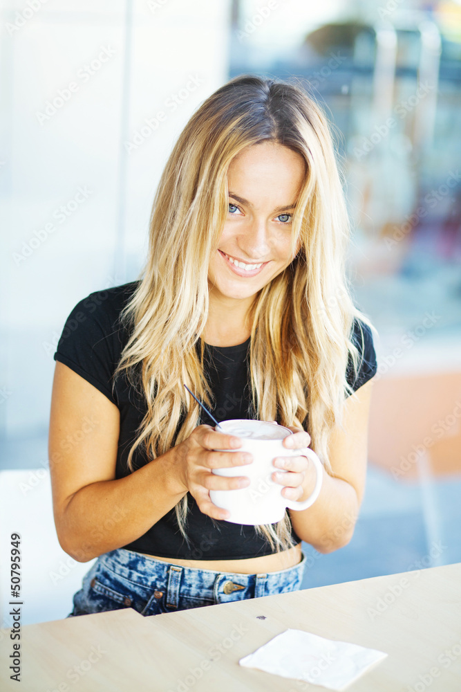 woman drinking coffee in the morning at restaurant woman drinking coffee in the morning at restaurant
