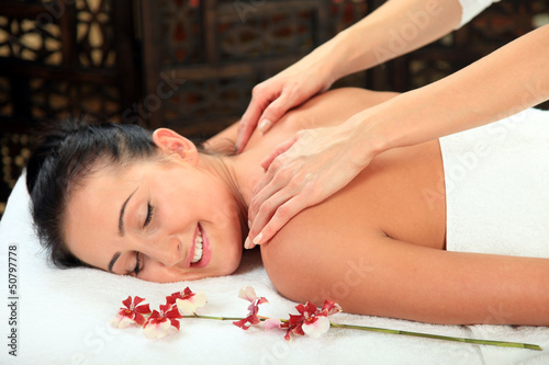 Young woman receiving massage