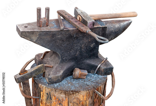 Obraz na plátně Old anvil with blacksmith tools on the outdoors