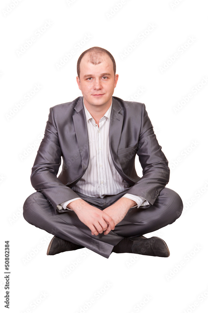 man sits cross-legged man sits cross-legged