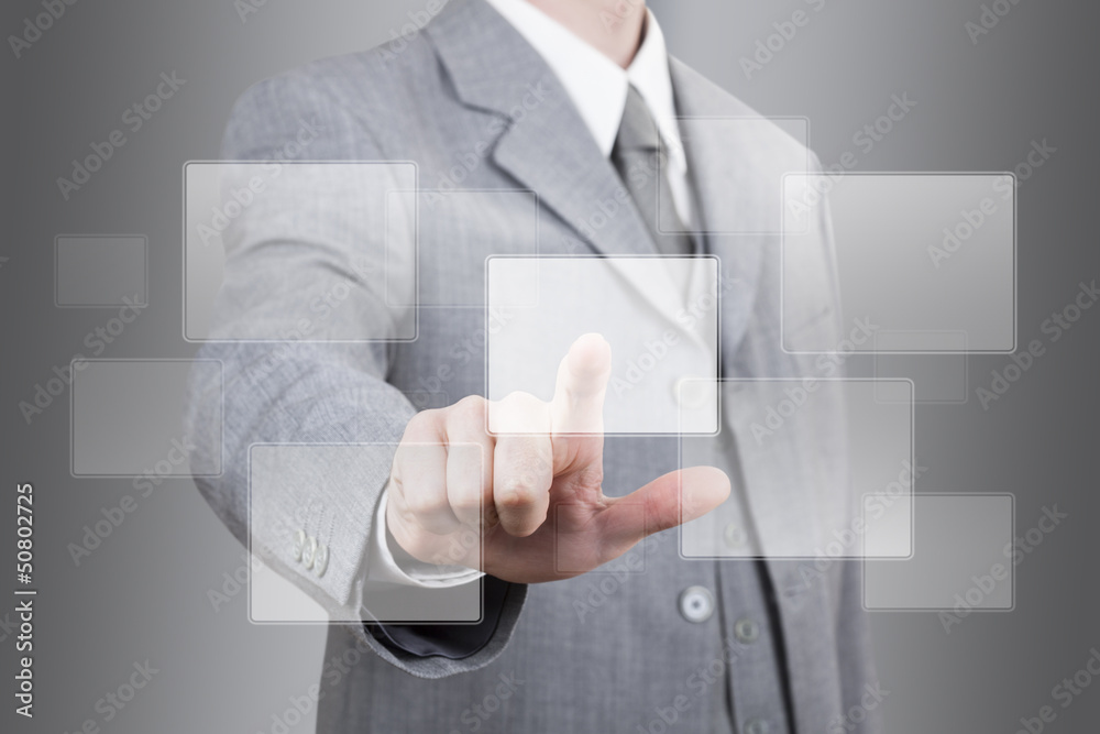 businessman hand pushing an empty touch screen businessman hand pushing an empty touch screen