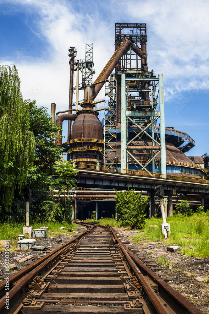 Rusted railway and abandoned steel works in outside