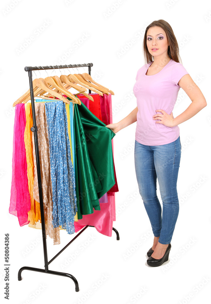Young girl chooses fabric for future dress isolated on white Young girl chooses fabric for future dress isolated on white