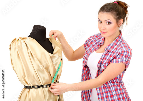 Beautiful young dressmaker ...