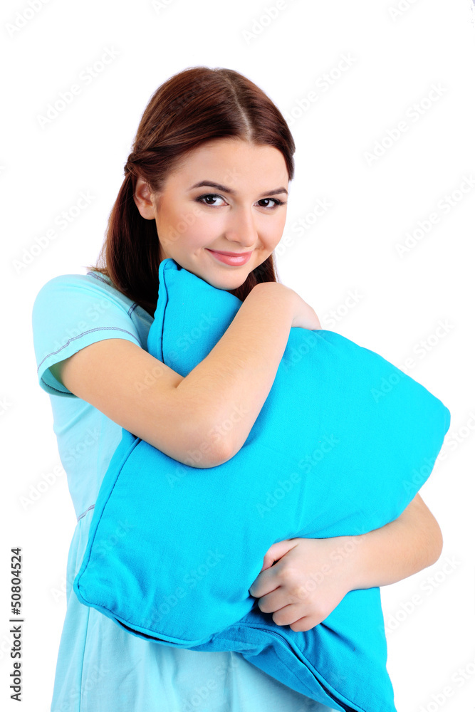 Beautiful young girl with pillow isolated on white. Beautiful young girl with pillow isolated on white.