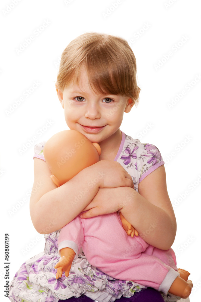 Little girl hugging doll. Nursing concept. Little girl hugging doll. Nursing concept.