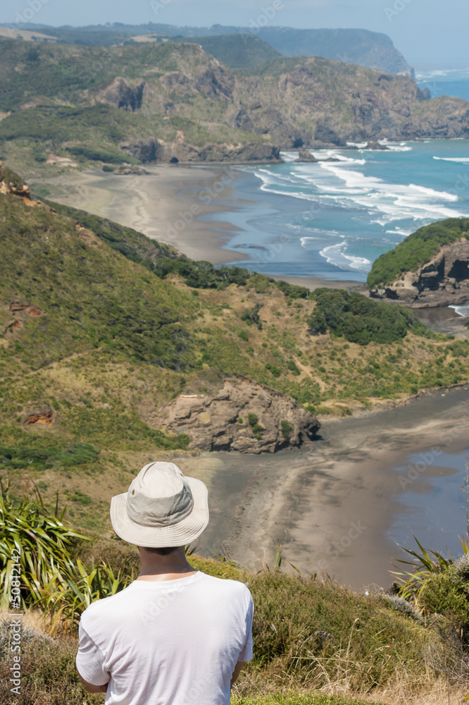 man admiring New Zealand coast