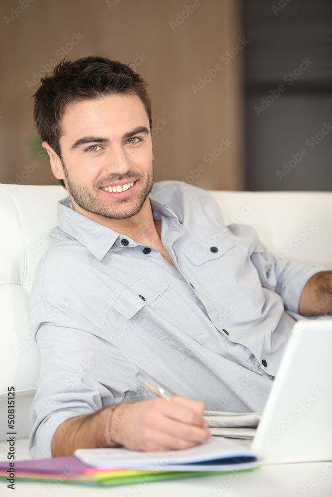 Man working from living room Man working from living room
