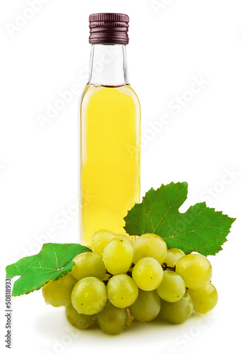 Glass bottle of green wine vinegar