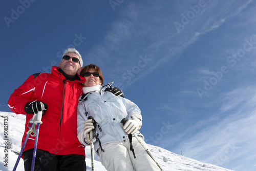 senior couple skiing