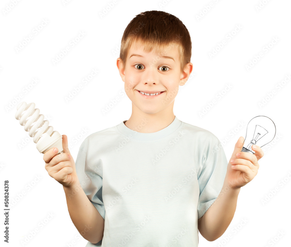 cute kid is choosing energy saving light bulb. isolated cute kid is choosing energy saving light bulb. isolated
