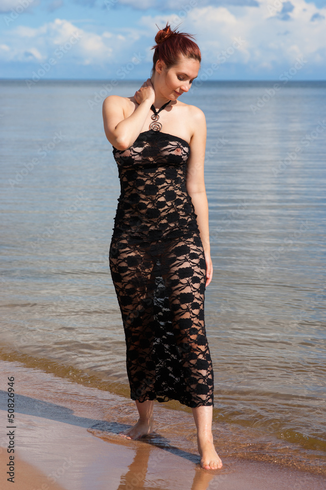 Woman in black lace dress