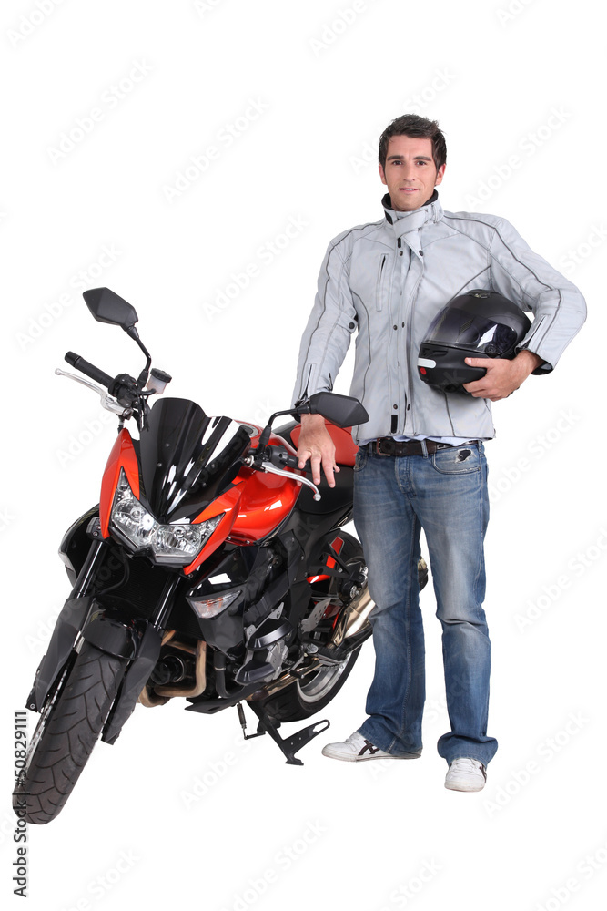 Motorcyclist with his motorbike Motorcyclist with his motorbike