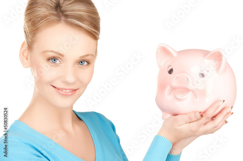 lovely woman with big piggy bank