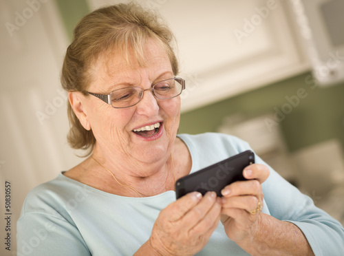 Senior Adult Woman Texting ...