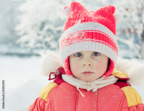 The kid in red jacket winter.