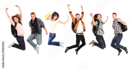 Happy young caucasian people jumping into the air