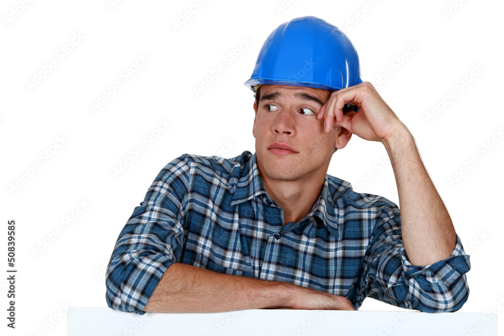 Anxious young builder Anxious young builder