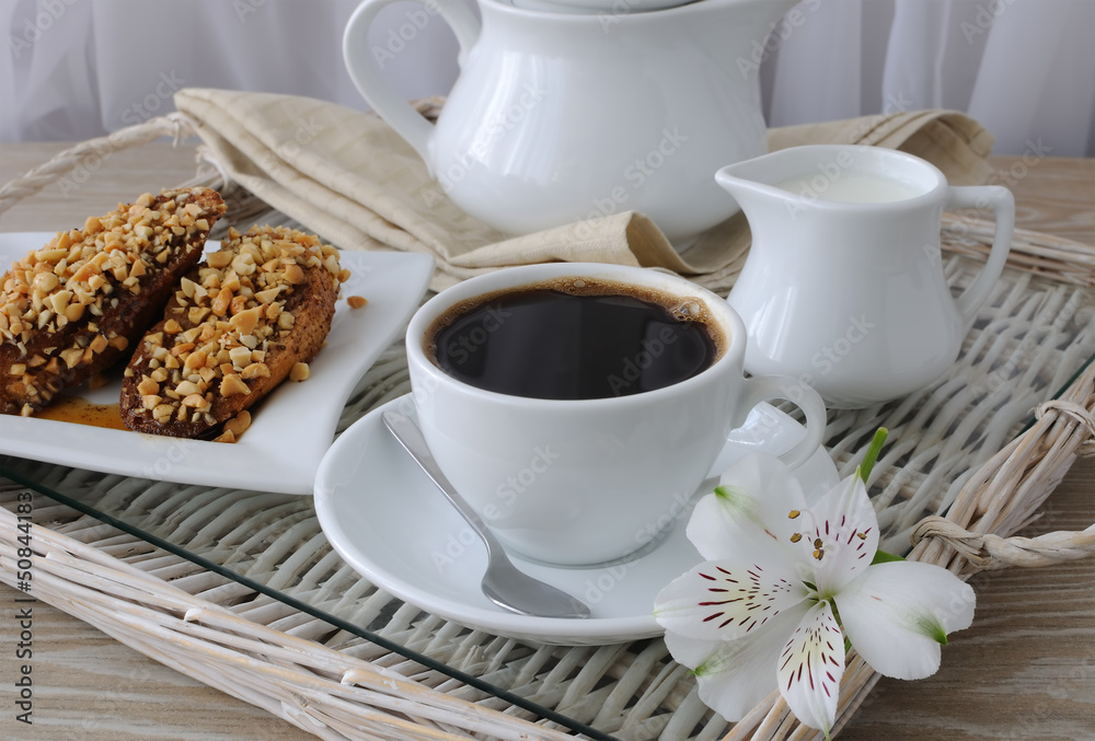 French toast with walnuts and cinnamon and a cup of coffee French toast with walnuts and cinnamon and a cup of coffee