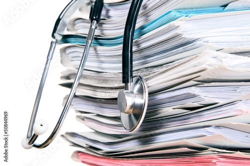 Stethoscope is lying on papers