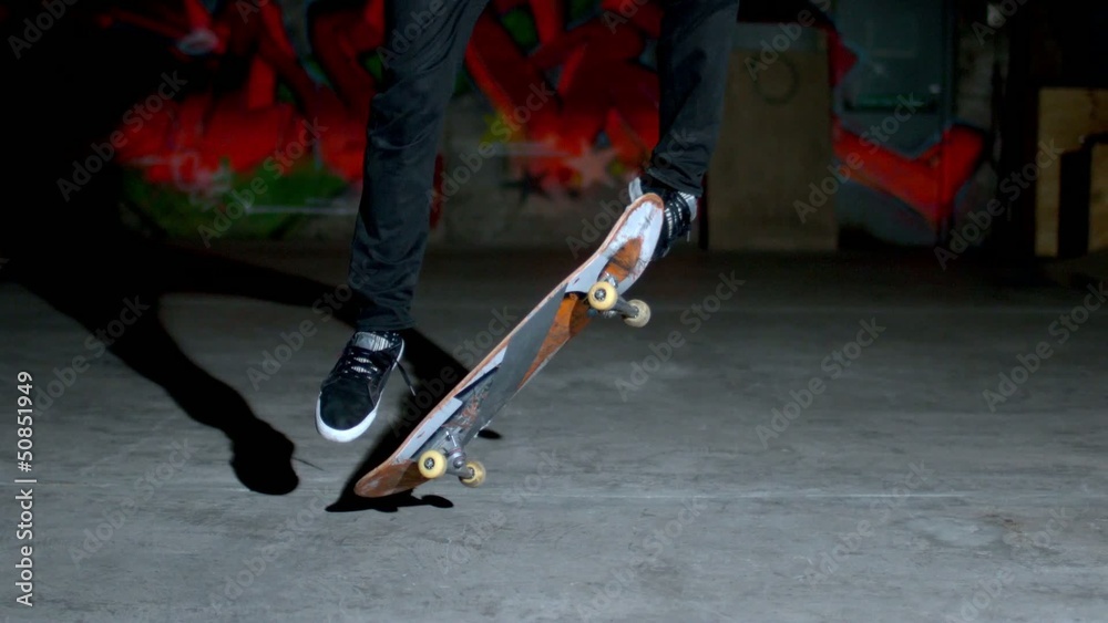 Skater rolling into kickflip trick