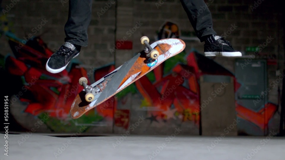 Close up of skater doing double flip trick
