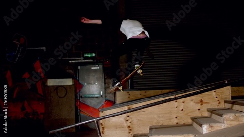Skater doing dipped ollie down steps