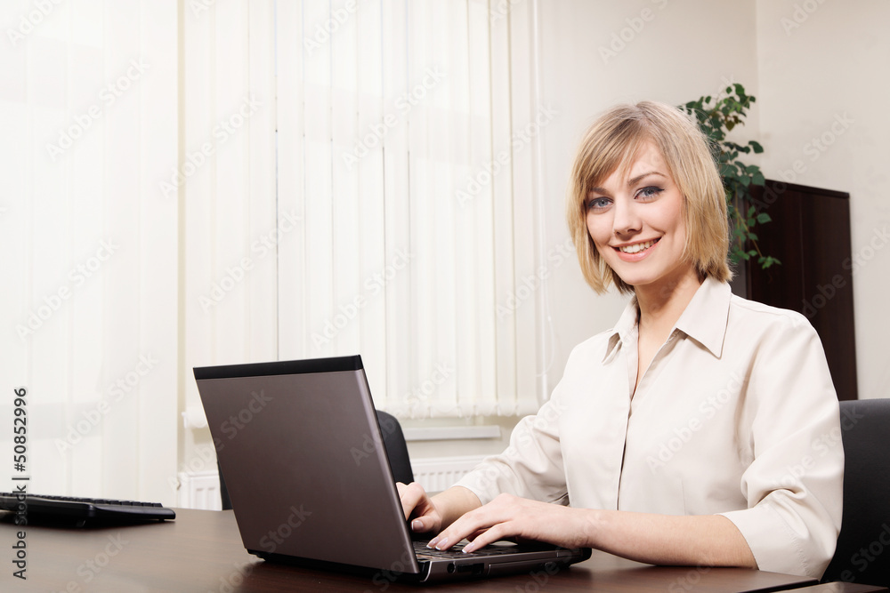Young woman working with computer Young woman working with computer