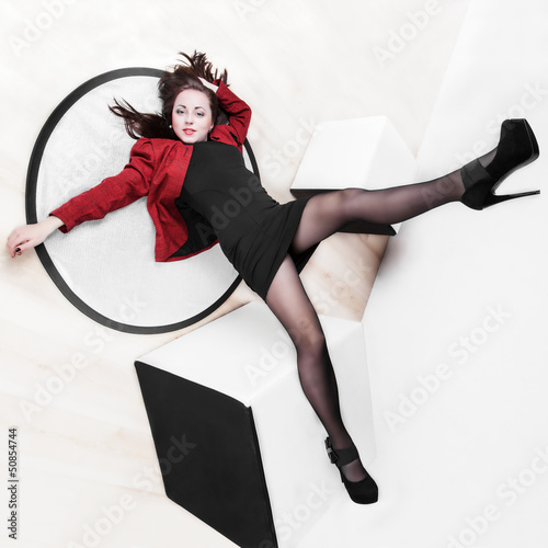 Leggy girl posing in studio