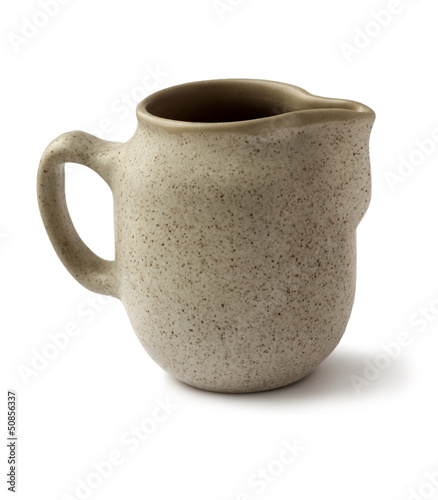 Ceramics jug isolated on white