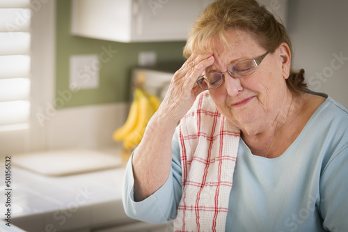 Sad Crying Senior Adult Wom...