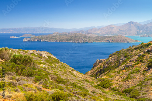 Turquise water of Mirabello bay with Spinalonga island on Crete