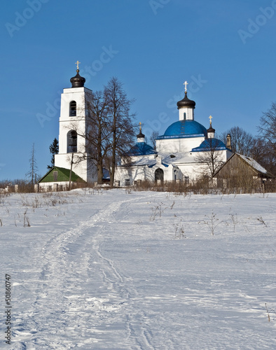 Old russian country church in winter time