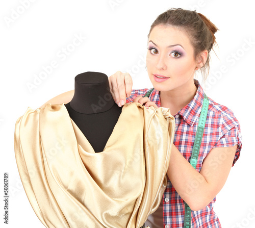 Beautiful young dressmaker ...
