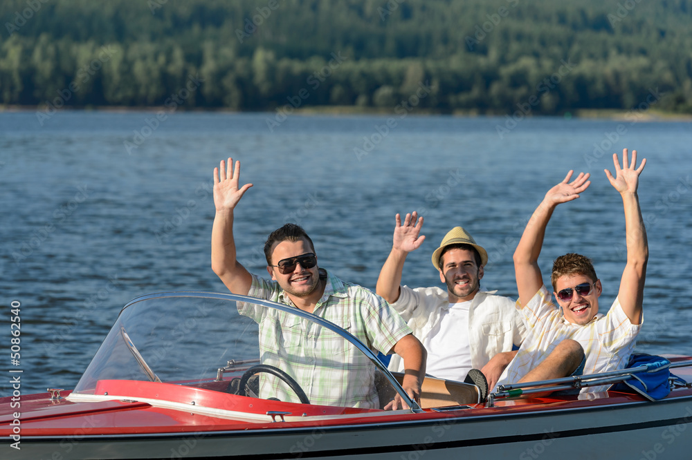 © CandyBox Images - Cheerful young guys partying in speed boat © CandyBox Images - Cheerful young guys partying in speed boat